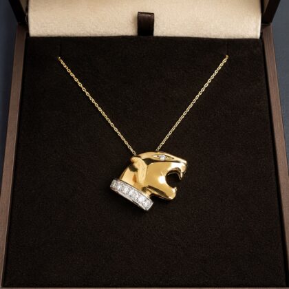 Pantera in oro giallo 18 kt e diamanti